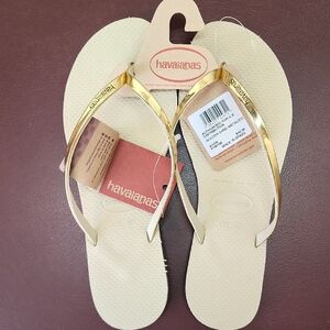 Havaianas Slim Flip Flops in Cream with Gold Straps